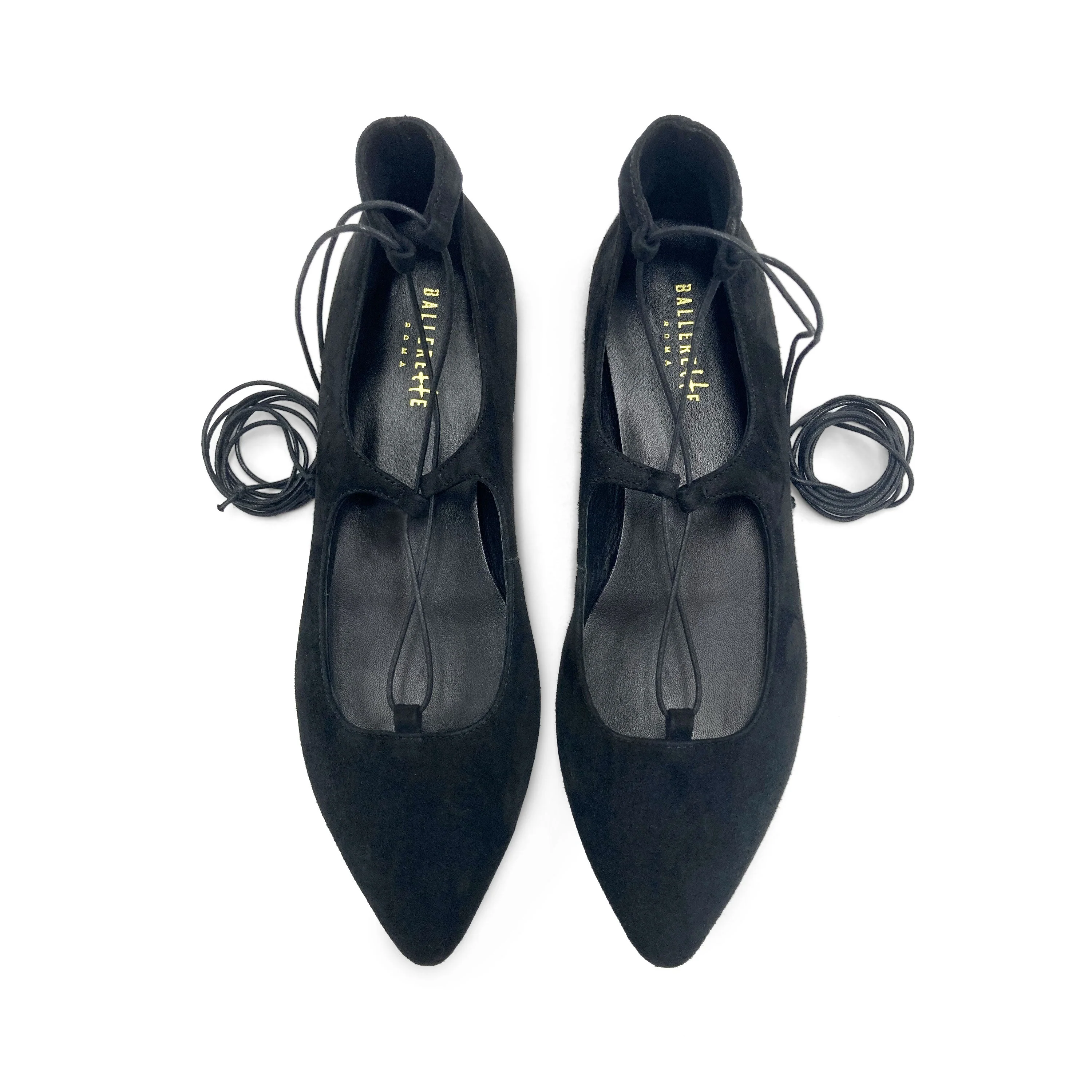 Black suede ballet flats with straps