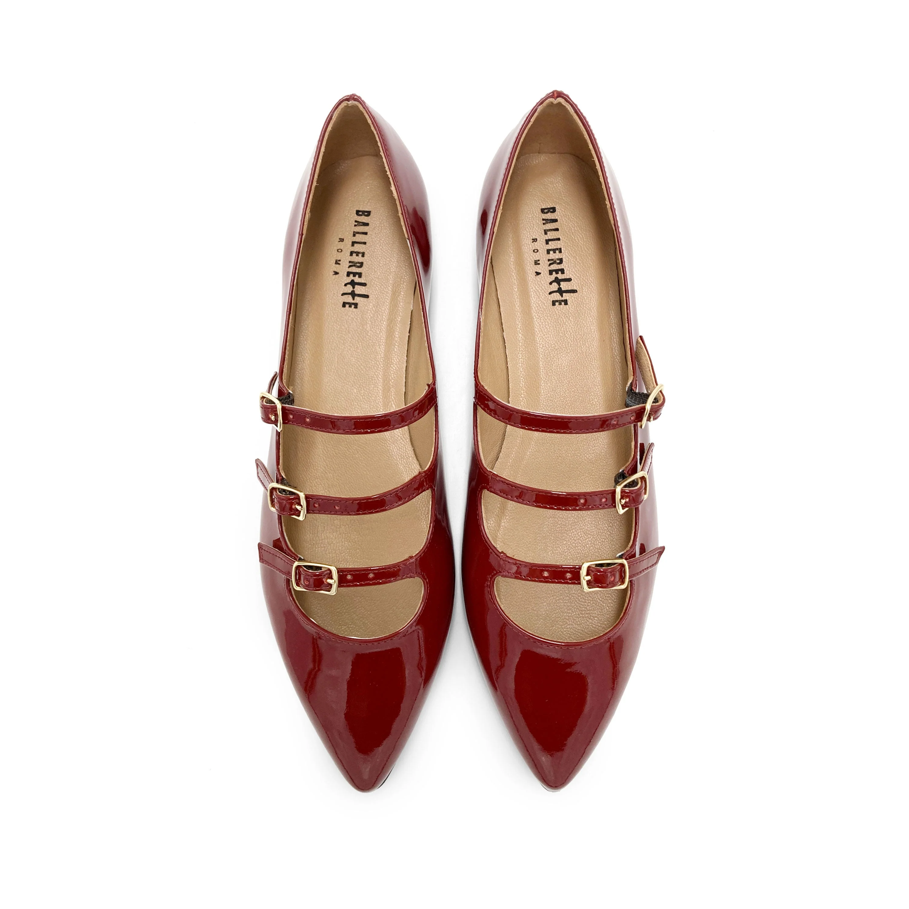 Red shiny pointed ballet flats with three straps