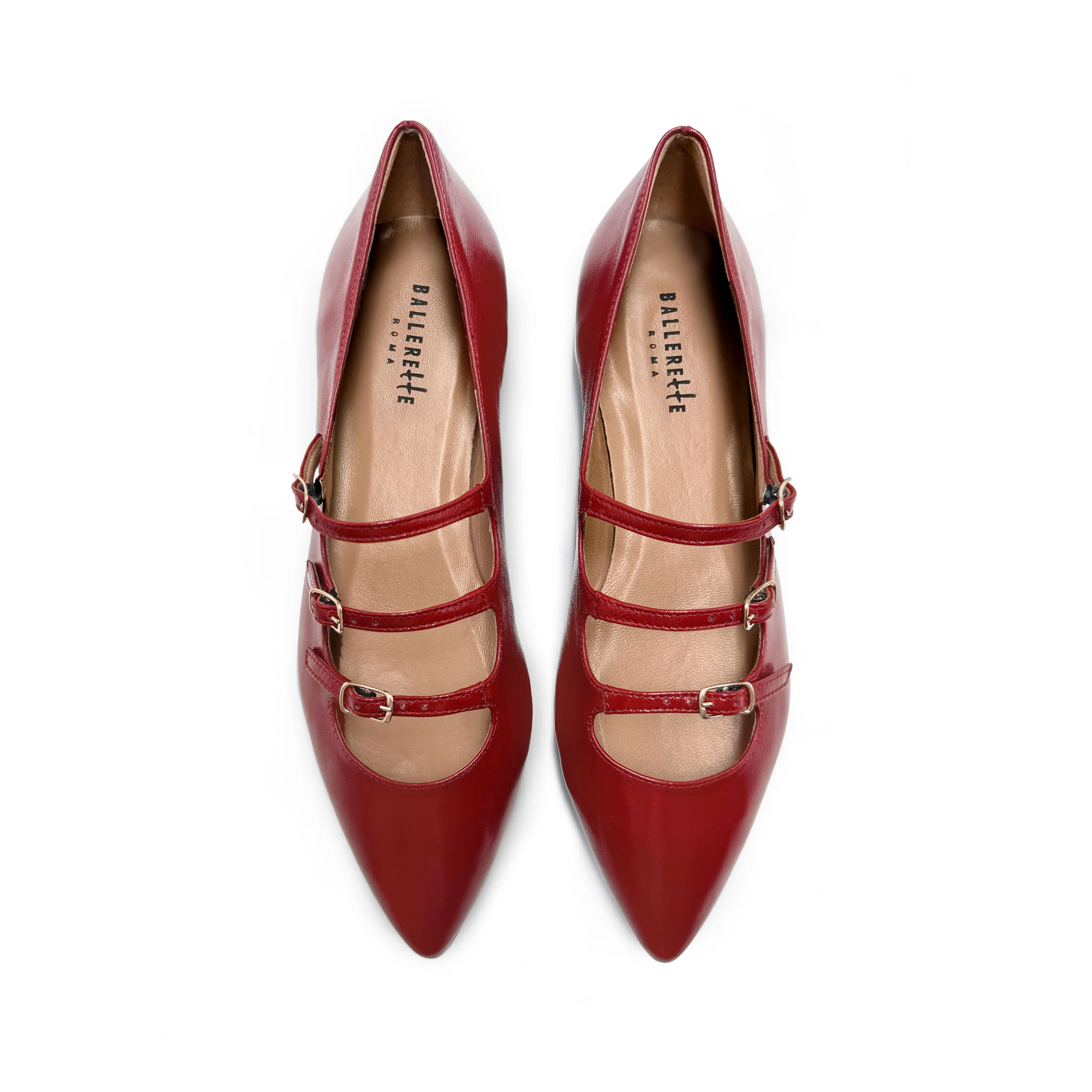 Red shiny pointed-toe ballet flats with straps